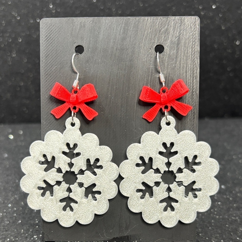 Festive Snowflake Earrings with Red Bows